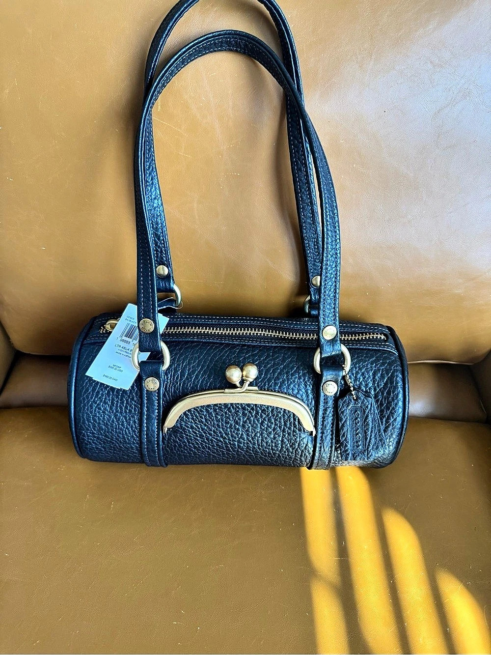 NWT Coach black kisslock barrel bag
